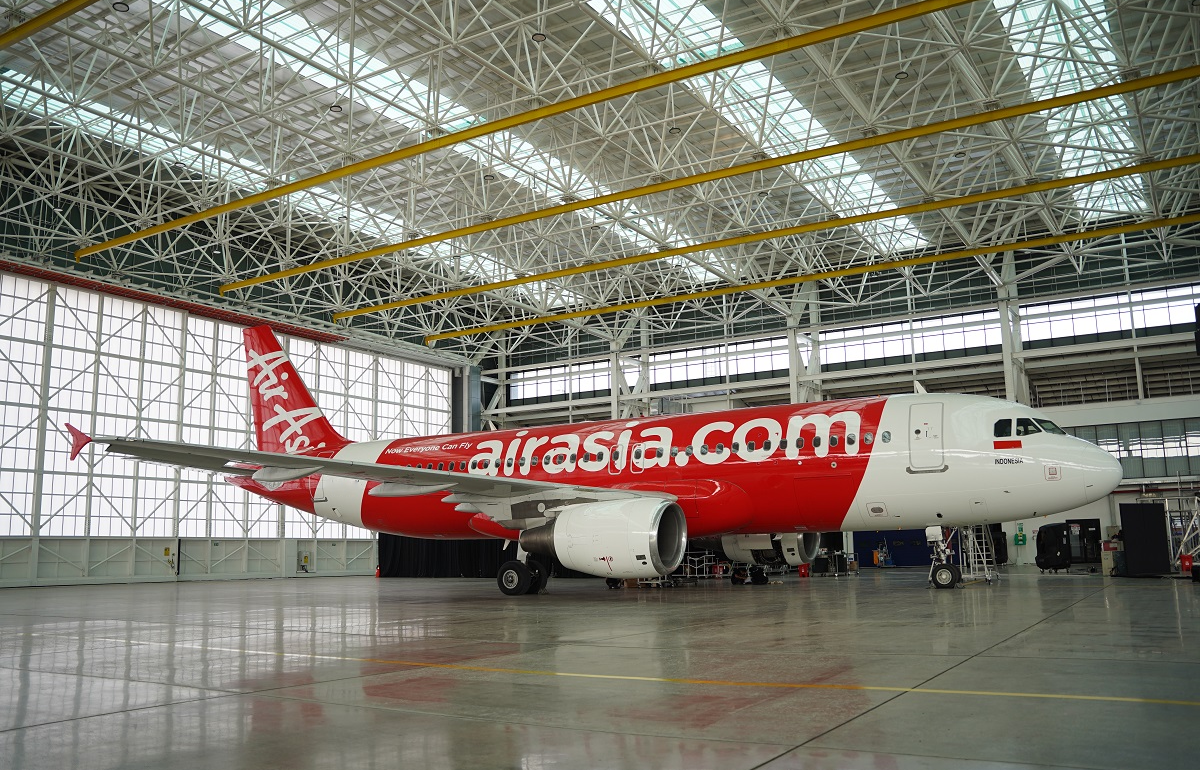 air asia aircraft in maintenance hangar of fl technics